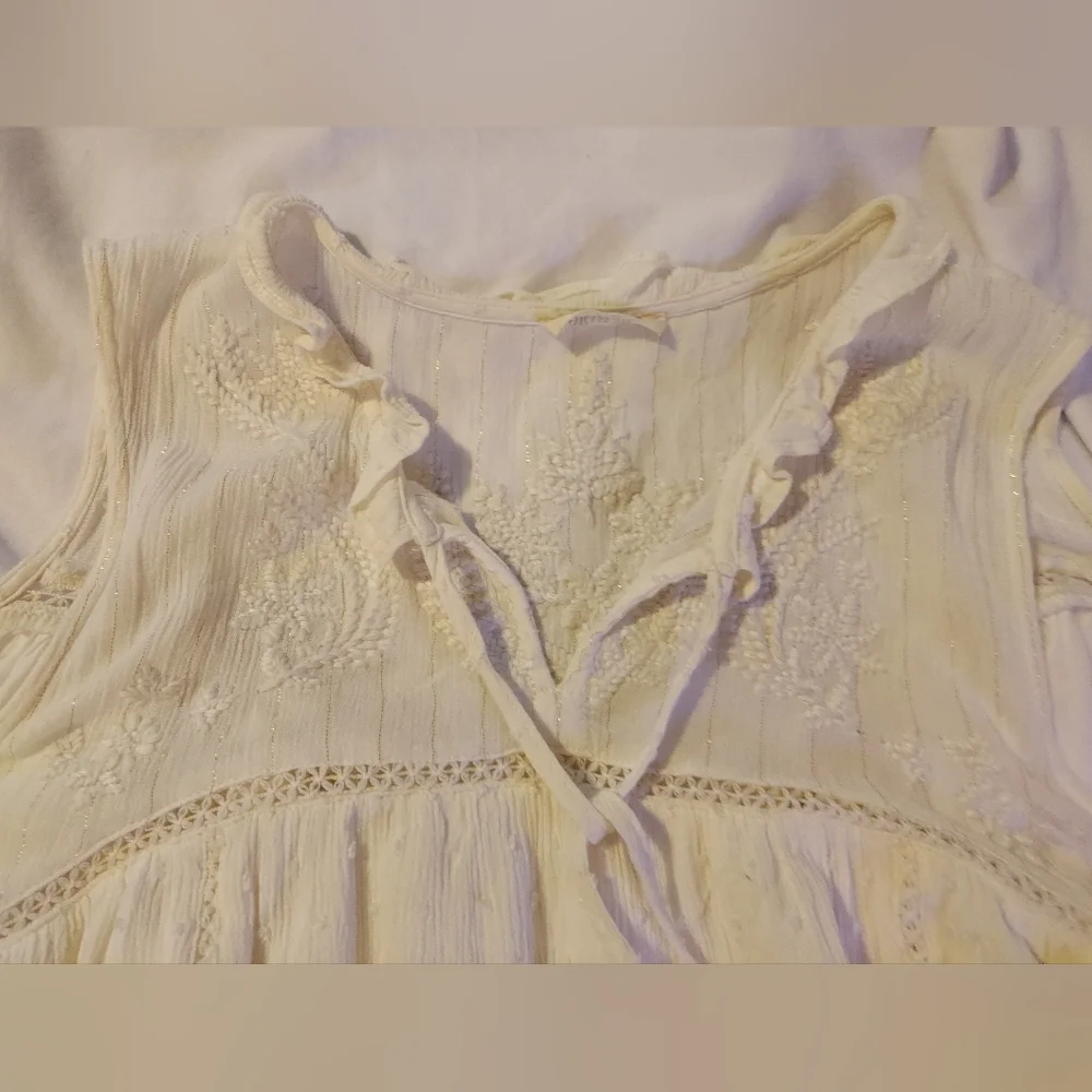 Miss Me Cream Boho Flowy Feminine Sleeveless Blouse With Tassel Ties - Picture 7 of 9